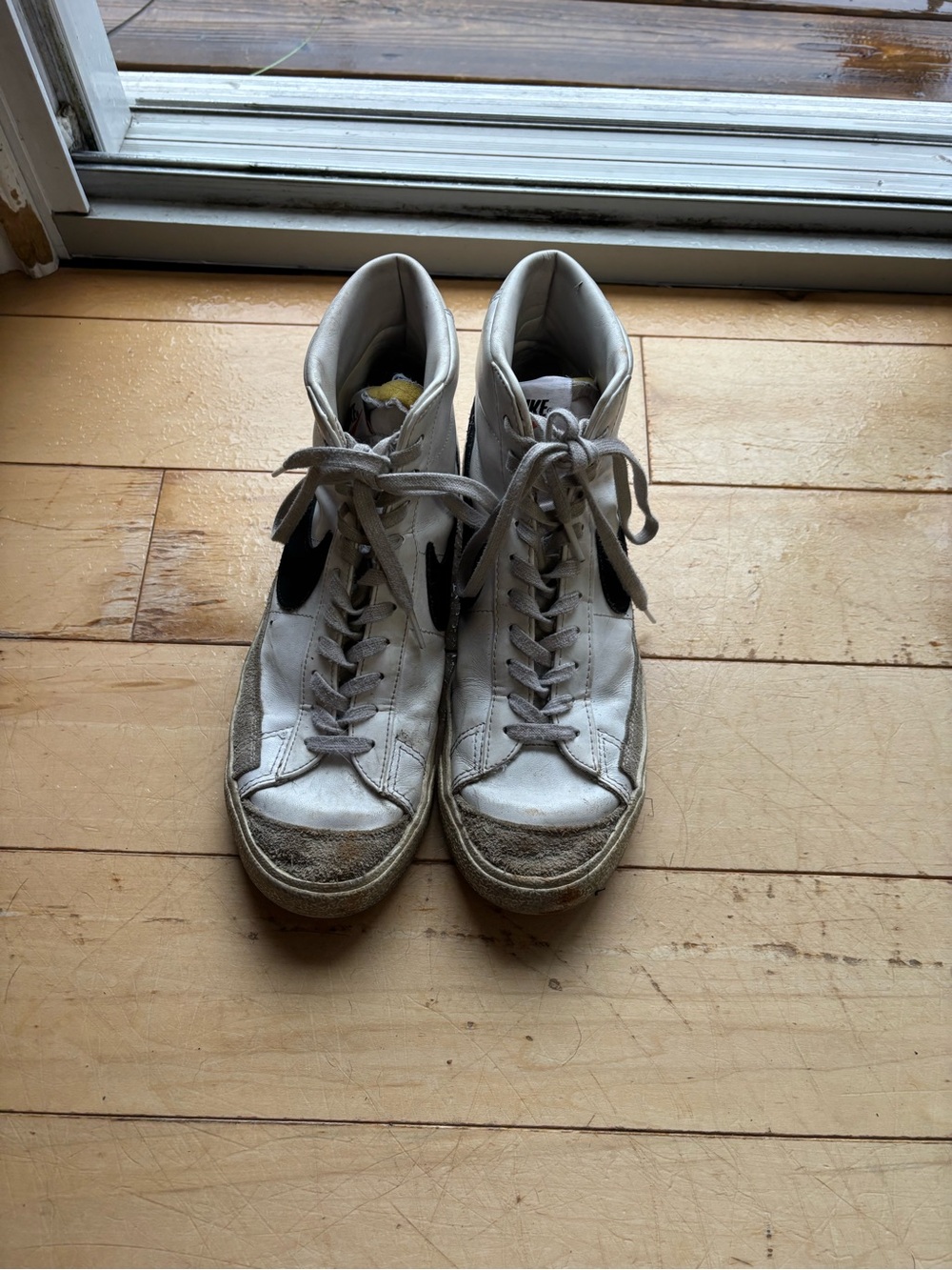 Nike Blazers with black Nike logo